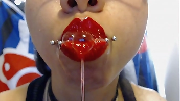 Bright Red Lips Drool and Spit a LOT of Saliva