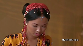 Thai masseuse gives footjob