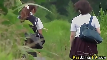 Urinating teen asians