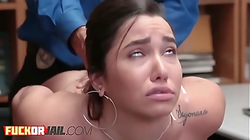 Busty brunette teen experiencing wild orgasm at the office