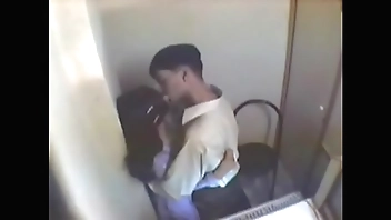 indian girl having fun with her boyfriend in internet cafe