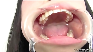 Licking the glass Showing teeth, saliva