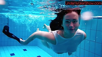 Perfect shaved teen in the pool