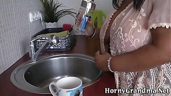 Busty granny has anal sex