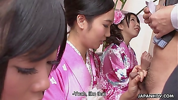 Three geishas sucking on one lonely cock